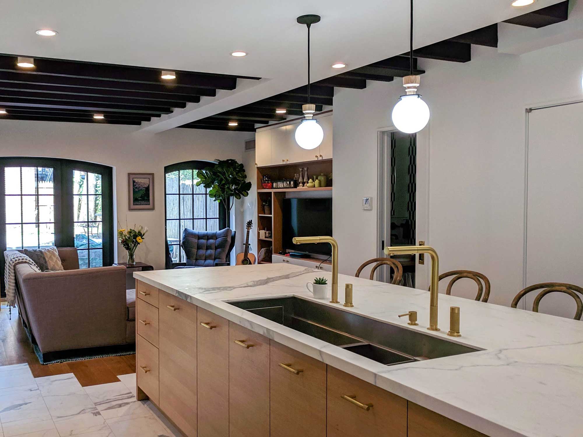 Kitchen Island with sink and pendant lighting
